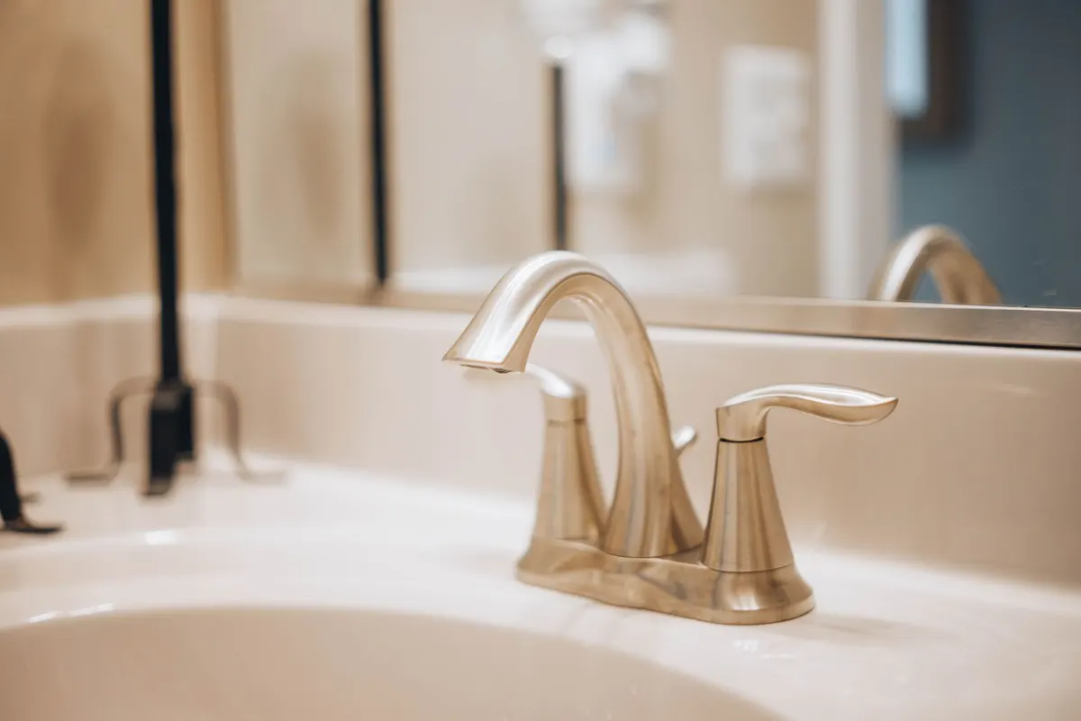 Newly installed brushed-nickel bathroom faucet